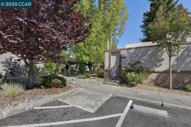 Step into this sophisticated level-in, single row and end unit on Rossmoor Golf Course in California - for sale on GolfHomes.com, golf home, golf lot