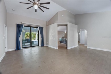 NOT IN A FLOOD ZONE! Metal roof, impact windows and sliders, new on Seminole Lakes Country Club in Florida - for sale on GolfHomes.com, golf home, golf lot