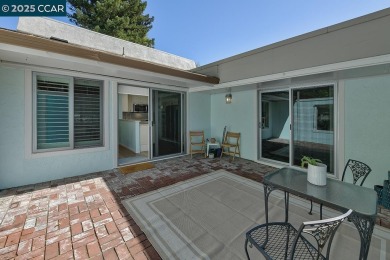 Step into this sophisticated level-in, single row and end unit on Rossmoor Golf Course in California - for sale on GolfHomes.com, golf home, golf lot