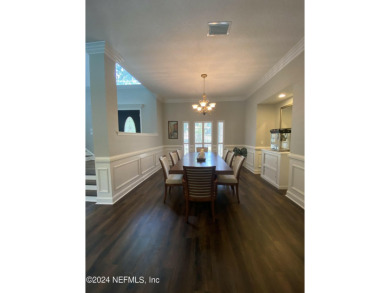 Large 2-story mostly brick home in serene Hidden Hills. Situated on Hidden Hills Country Club in Florida - for sale on GolfHomes.com, golf home, golf lot