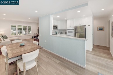 Step into this sophisticated level-in, single row and end unit on Rossmoor Golf Course in California - for sale on GolfHomes.com, golf home, golf lot