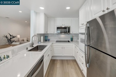 Step into this sophisticated level-in, single row and end unit on Rossmoor Golf Course in California - for sale on GolfHomes.com, golf home, golf lot