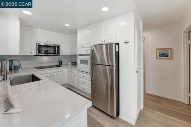 Step into this sophisticated level-in, single row and end unit on Rossmoor Golf Course in California - for sale on GolfHomes.com, golf home, golf lot