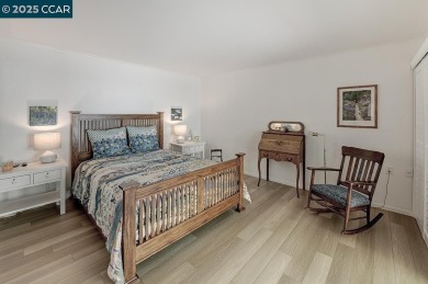 Step into this sophisticated level-in, single row and end unit on Rossmoor Golf Course in California - for sale on GolfHomes.com, golf home, golf lot