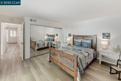 Step into this sophisticated level-in, single row and end unit on Rossmoor Golf Course in California - for sale on GolfHomes.com, golf home, golf lot