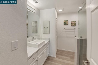 Step into this sophisticated level-in, single row and end unit on Rossmoor Golf Course in California - for sale on GolfHomes.com, golf home, golf lot