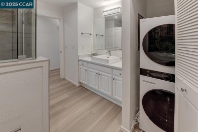 Step into this sophisticated level-in, single row and end unit on Rossmoor Golf Course in California - for sale on GolfHomes.com, golf home, golf lot