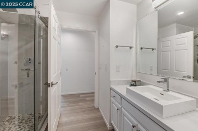 Step into this sophisticated level-in, single row and end unit on Rossmoor Golf Course in California - for sale on GolfHomes.com, golf home, golf lot