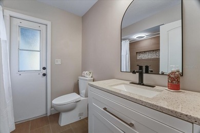 NOT IN A FLOOD ZONE! Metal roof, impact windows and sliders, new on Seminole Lakes Country Club in Florida - for sale on GolfHomes.com, golf home, golf lot