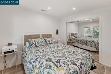 Step into this sophisticated level-in, single row and end unit on Rossmoor Golf Course in California - for sale on GolfHomes.com, golf home, golf lot
