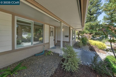 Step into this sophisticated level-in, single row and end unit on Rossmoor Golf Course in California - for sale on GolfHomes.com, golf home, golf lot