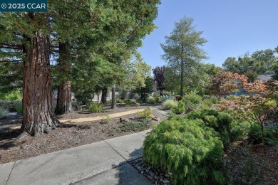 Step into this sophisticated level-in, single row and end unit on Rossmoor Golf Course in California - for sale on GolfHomes.com, golf home, golf lot