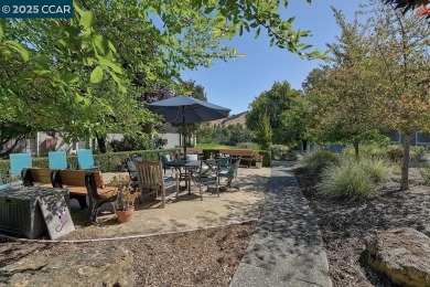 Step into this sophisticated level-in, single row and end unit on Rossmoor Golf Course in California - for sale on GolfHomes.com, golf home, golf lot