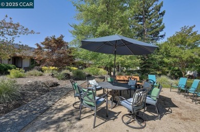 Step into this sophisticated level-in, single row and end unit on Rossmoor Golf Course in California - for sale on GolfHomes.com, golf home, golf lot