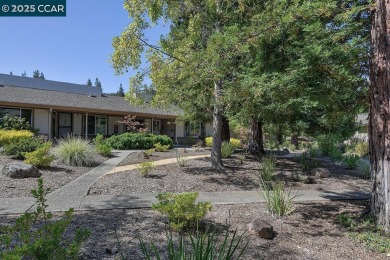 Step into this sophisticated level-in, single row and end unit on Rossmoor Golf Course in California - for sale on GolfHomes.com, golf home, golf lot
