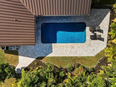 NOT IN A FLOOD ZONE! Metal roof, impact windows and sliders, new on Seminole Lakes Country Club in Florida - for sale on GolfHomes.com, golf home, golf lot