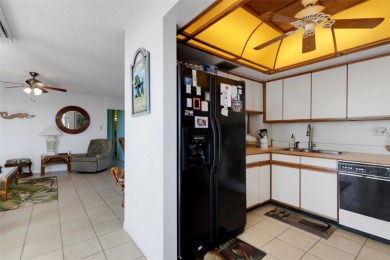 Enjoy the best of Florida living with this beautiful 2-bedroom on Isla Del Sol Yacht and Country Club in Florida - for sale on GolfHomes.com, golf home, golf lot