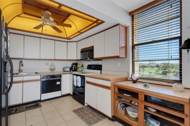 Enjoy the best of Florida living with this beautiful 2-bedroom on Isla Del Sol Yacht and Country Club in Florida - for sale on GolfHomes.com, golf home, golf lot