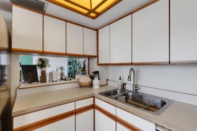 Enjoy the best of Florida living with this beautiful 2-bedroom on Isla Del Sol Yacht and Country Club in Florida - for sale on GolfHomes.com, golf home, golf lot