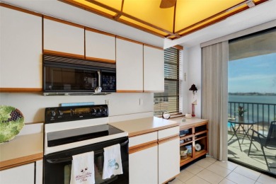 Enjoy the best of Florida living with this beautiful 2-bedroom on Isla Del Sol Yacht and Country Club in Florida - for sale on GolfHomes.com, golf home, golf lot