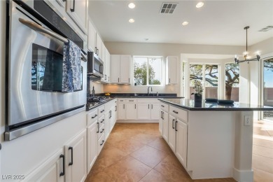 Discover luxury living in Sun City Anthem with stunning mountain on Revere Golf Club in Nevada - for sale on GolfHomes.com, golf home, golf lot