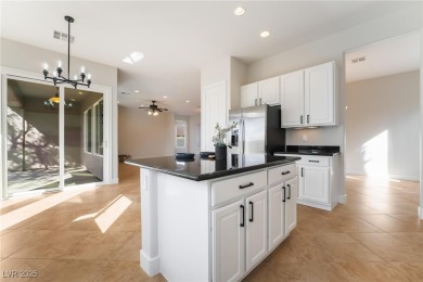 Discover luxury living in Sun City Anthem with stunning mountain on Revere Golf Club in Nevada - for sale on GolfHomes.com, golf home, golf lot