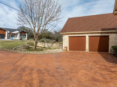 This stunning home is inside a secured gated community that is on White Bluff Resort - Old Course in Texas - for sale on GolfHomes.com, golf home, golf lot