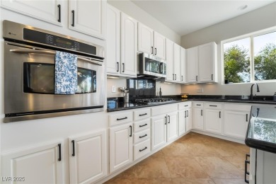 Discover luxury living in Sun City Anthem with stunning mountain on Revere Golf Club in Nevada - for sale on GolfHomes.com, golf home, golf lot