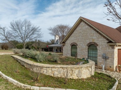 This stunning home is inside a secured gated community that is on White Bluff Resort - Old Course in Texas - for sale on GolfHomes.com, golf home, golf lot