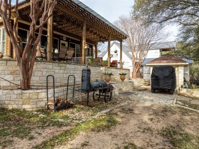 This stunning home is inside a secured gated community that is on White Bluff Resort - Old Course in Texas - for sale on GolfHomes.com, golf home, golf lot