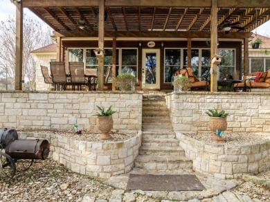 This stunning home is inside a secured gated community that is on White Bluff Resort - Old Course in Texas - for sale on GolfHomes.com, golf home, golf lot