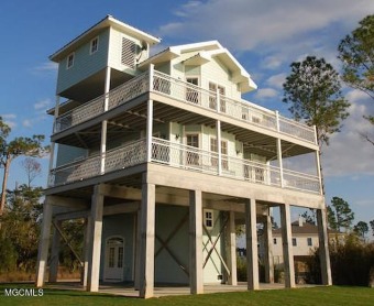 Breathtaking Views and over 100 feet on the water make this on Pass Christian Isles Golf Club in Mississippi - for sale on GolfHomes.com, golf home, golf lot