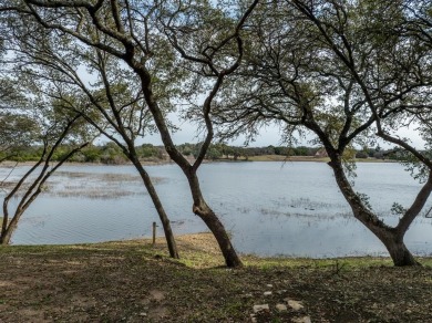 This stunning home is inside a secured gated community that is on White Bluff Resort - Old Course in Texas - for sale on GolfHomes.com, golf home, golf lot