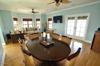 Breathtaking Views and over 100 feet on the water make this on Pass Christian Isles Golf Club in Mississippi - for sale on GolfHomes.com, golf home, golf lot