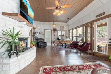 This stunning home is inside a secured gated community that is on White Bluff Resort - Old Course in Texas - for sale on GolfHomes.com, golf home, golf lot