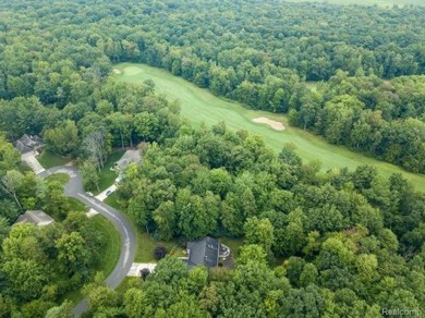 Vacant land in the prestigious Timber Point Estates ready for on The Timbers Golf Club in Michigan - for sale on GolfHomes.com, golf home, golf lot