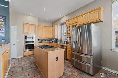 Beautiful 4 Bed, 4 Bath home in coveted Legacy Ridge Golf Course on Legacy Ridge Golf Course in Colorado - for sale on GolfHomes.com, golf home, golf lot