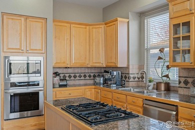 Beautiful 4 Bed, 4 Bath home in coveted Legacy Ridge Golf Course on Legacy Ridge Golf Course in Colorado - for sale on GolfHomes.com, golf home, golf lot