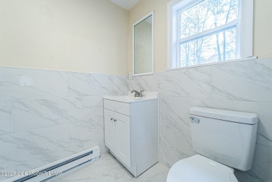 RENOVATED HILLCREST RAISED RANCH Totally Upgraded 3BR 2.5BA on Pocono Farms Country Club in Pennsylvania - for sale on GolfHomes.com, golf home, golf lot