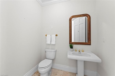 Experience timeless elegance and panoramic water views at 780 on Bentley Village Golf Course in Florida - for sale on GolfHomes.com, golf home, golf lot