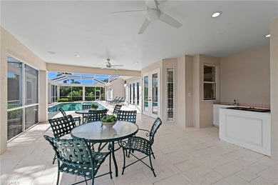 Experience timeless elegance and panoramic water views at 780 on Bentley Village Golf Course in Florida - for sale on GolfHomes.com, golf home, golf lot
