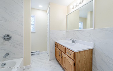 RENOVATED HILLCREST RAISED RANCH Totally Upgraded 3BR 2.5BA on Pocono Farms Country Club in Pennsylvania - for sale on GolfHomes.com, golf home, golf lot