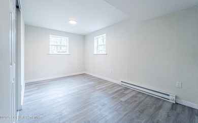 RENOVATED HILLCREST RAISED RANCH Totally Upgraded 3BR 2.5BA on Pocono Farms Country Club in Pennsylvania - for sale on GolfHomes.com, golf home, golf lot