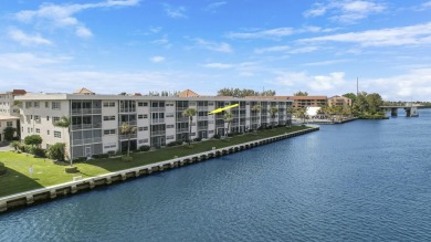 ALL ASSESSMENTS PAID IN FULL.  NEW IMPACT WINDOWS THROUGHOUT on North Palm Beach Country Club in Florida - for sale on GolfHomes.com, golf home, golf lot