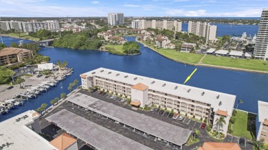 ALL ASSESSMENTS PAID IN FULL.  NEW IMPACT WINDOWS THROUGHOUT on North Palm Beach Country Club in Florida - for sale on GolfHomes.com, golf home, golf lot
