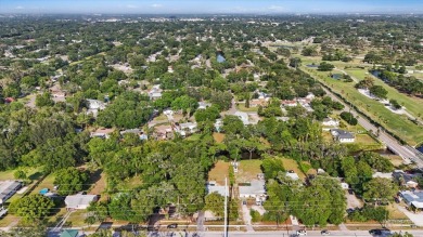 WATERFRONT PROPERTY HIGH AND DRY AFTER HELENE!  This property is on Clearwater Country Club in Florida - for sale on GolfHomes.com, golf home, golf lot