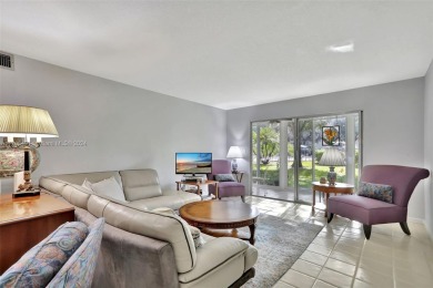 Welcome home to this desirable ground floor condo in one of the on Wynmoor Golf Course in Florida - for sale on GolfHomes.com, golf home, golf lot