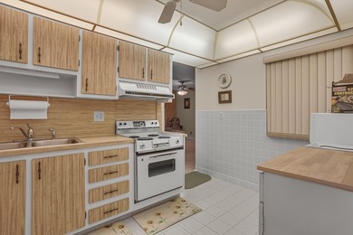 Welcome to this beautifully maintained 2-bedroom, 2-bath on Leisureville Community Golf Course in Florida - for sale on GolfHomes.com, golf home, golf lot