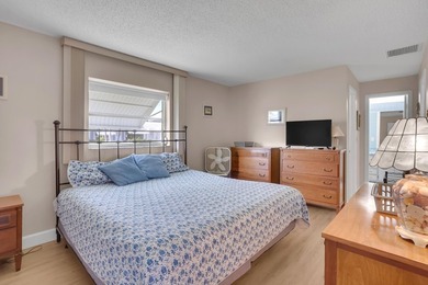 Welcome to this beautifully maintained 2-bedroom, 2-bath on Leisureville Community Golf Course in Florida - for sale on GolfHomes.com, golf home, golf lot