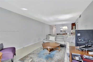 Welcome home to this desirable ground floor condo in one of the on Wynmoor Golf Course in Florida - for sale on GolfHomes.com, golf home, golf lot